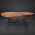 1215AA oval natural copper coffee table with hand-forged iron scroll base